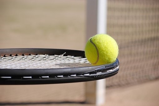 Tennis racket and ball